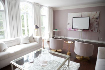 Beautiful living room with a presentation screen in a comfortable setting.