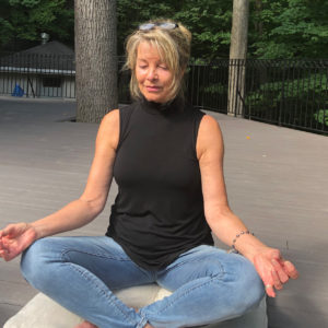 older woman meditating